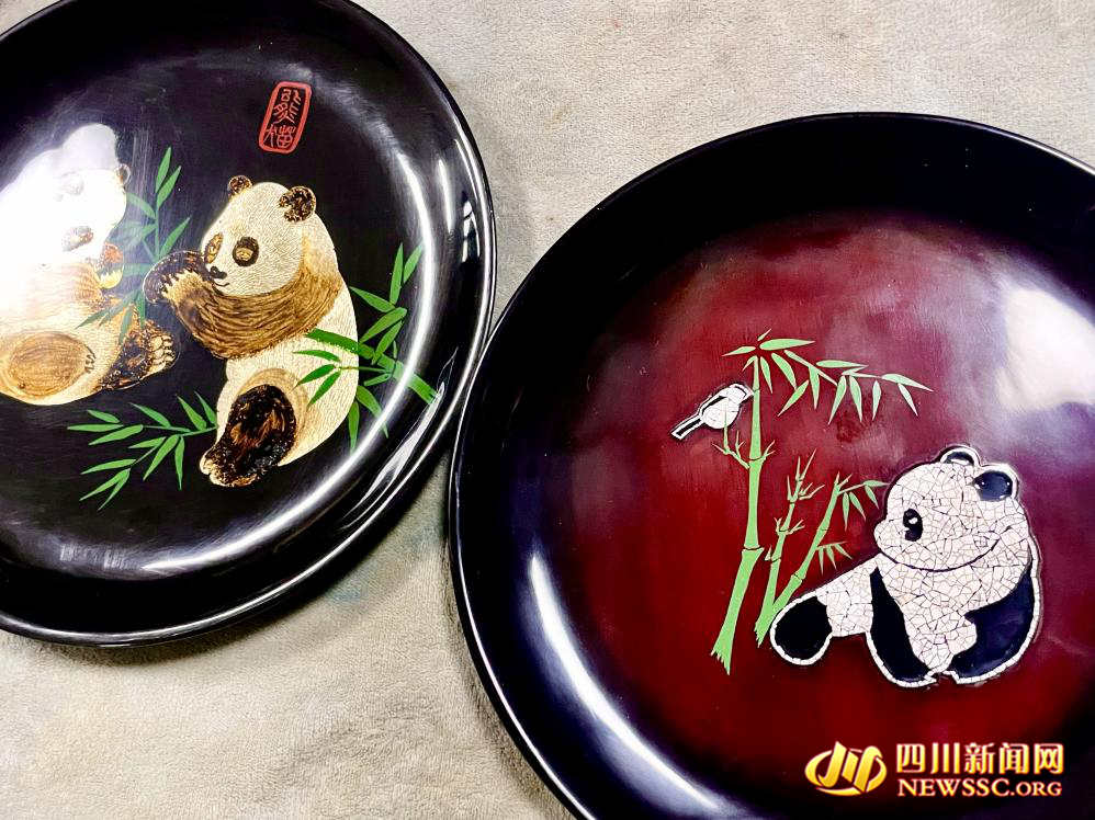 老款熊猫大漆漆盘（左）和新款（右）_副本.jpg